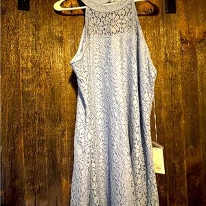 Super cute Candie’s halter style blue dress with criss cross back!  Size XL